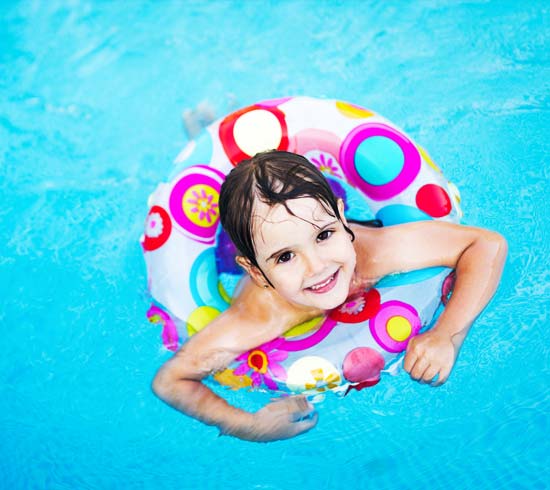 Little girl in the swimming pool